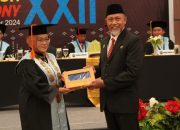 Wisuda STMIK Adhi Guna: Asisten Usman Ajak Alumni Berkontribusi dalam Era Digital dan Smart City