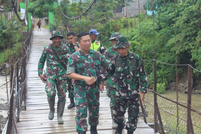 
					TMMD Kodim 1306/Kota Palu Perkuat Infrastruktur Jembatan Gantung di Bambasiang, Palasa