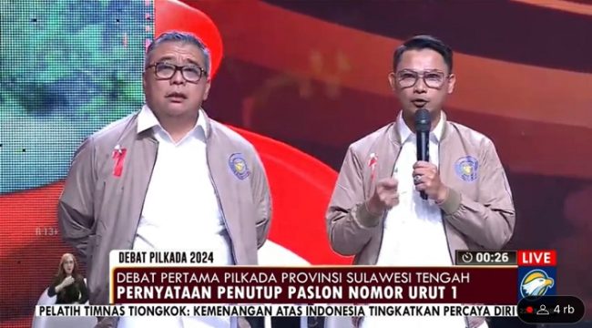 Pasangan calon Gubernur dan Wakil Gubernur Sulawesi Tengah nomor urut 1, Ahmad HM Ali (AA) - Abdul Karim Al Jufri (AKA) saat mengikuti 
debat kandidat terbuka pertama yang digelar Komisi Pemilihan Umum Daerah (KPUD) provinsi itu secara live di Metro TV, Rabu (16/10/2024) malam. Dok: Tangkapan Layar Metro TV 